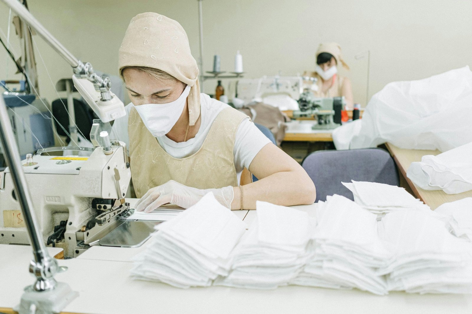 a woman is sewing
